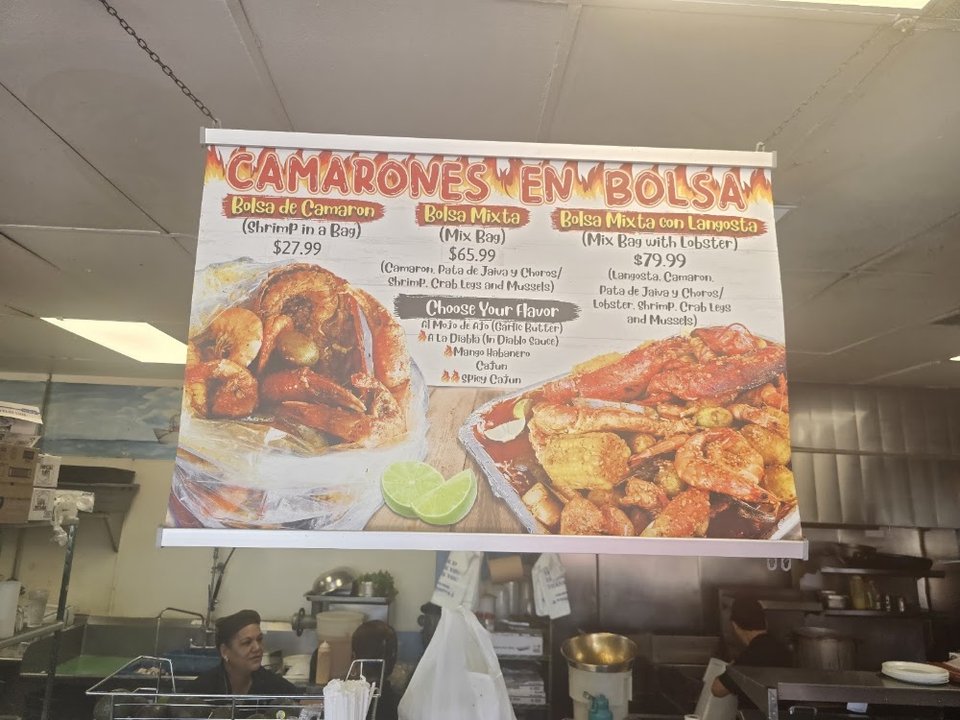 Seafood menu with caldo and tostadas.